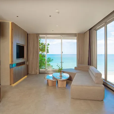 M Hotel Danang Exterior photo Living room of a suite at the hotel