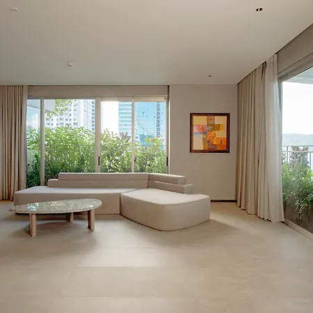 M Hotel Danang Exterior photo A living room with a view of the river