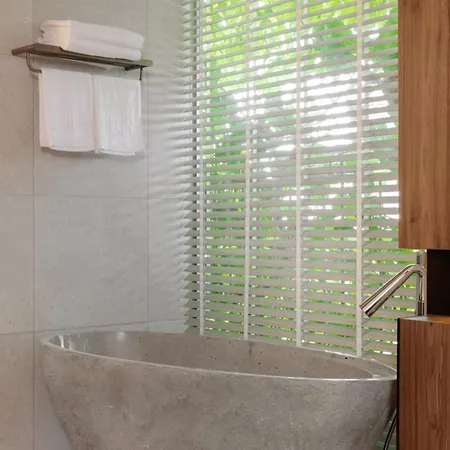 M Hotel Danang Exterior photo A modern Japanese bathtub