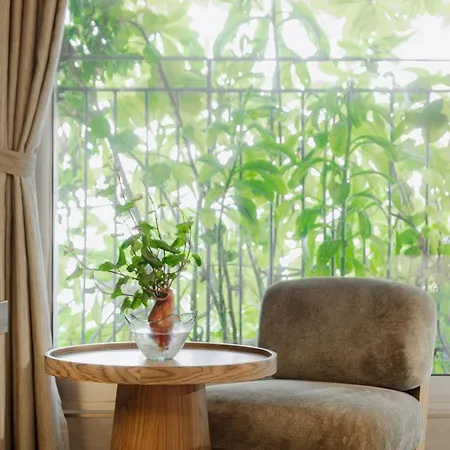 M Hotel Danang Exterior photo A view of the garden from the room